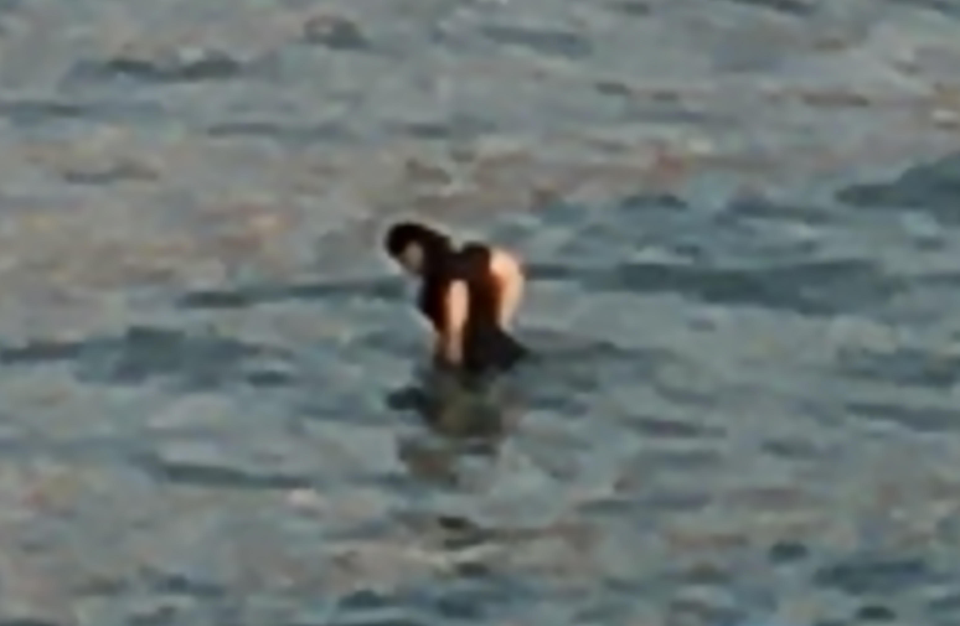 blurry bather in the ocean